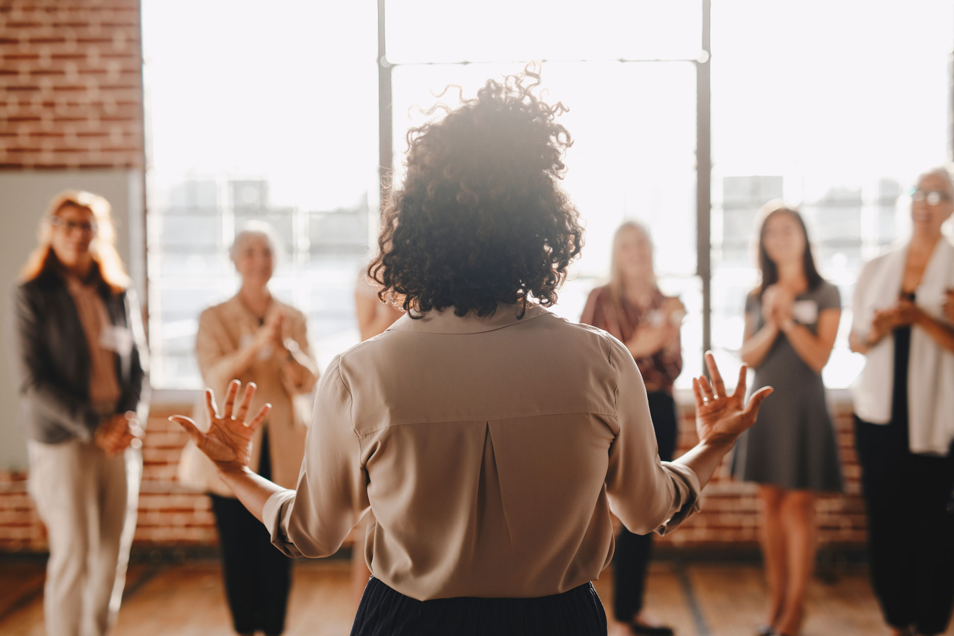 Group of women coming together to worship.