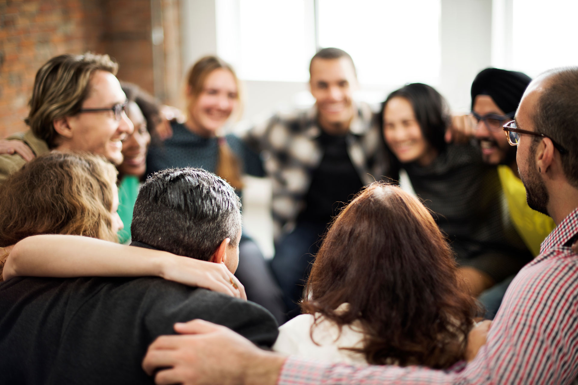 Group of people coming together as a community.